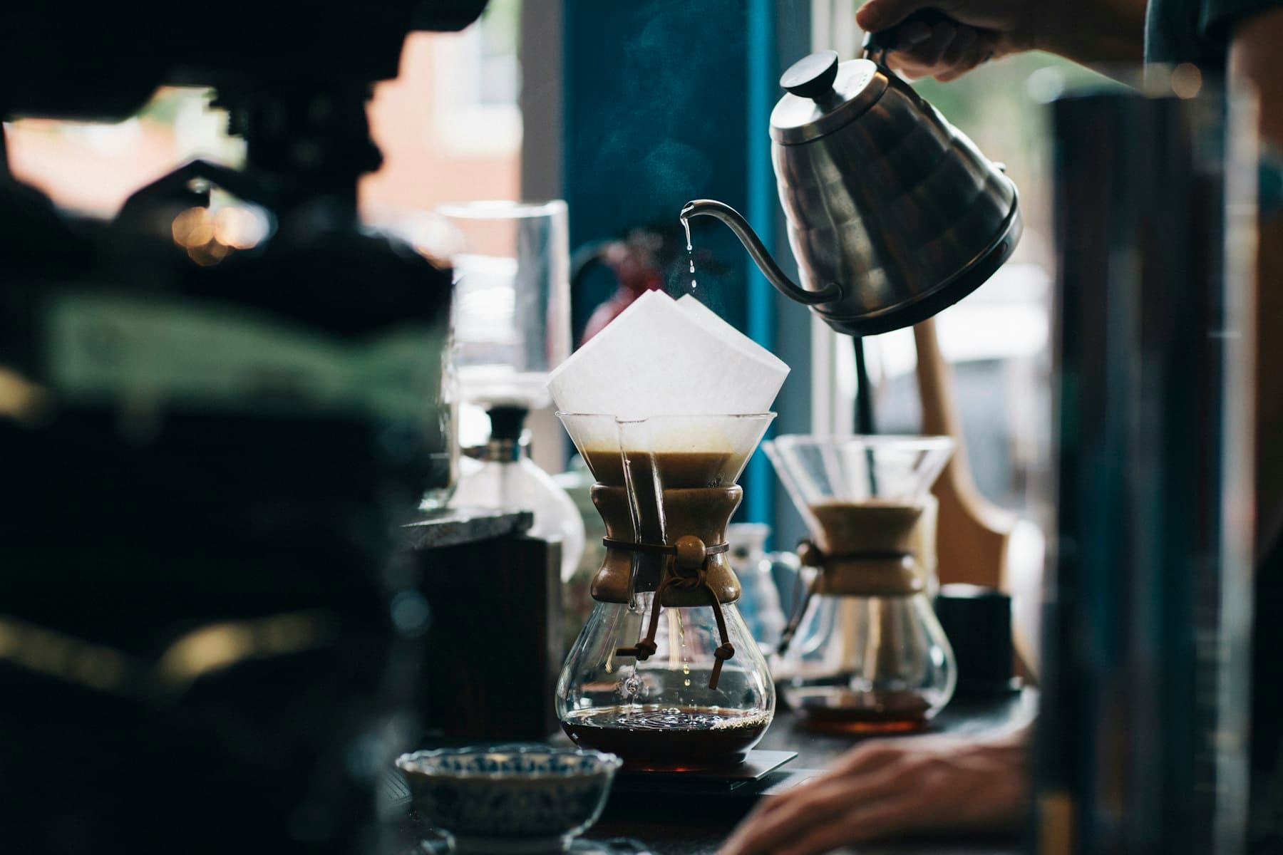 Steam rising from a slow pour-over at the Coffee Matters counter